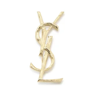 GOLD METAL CASSANDRE OPIUM BROOCHE